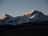 07 Sunrise On Phola Gangchen And Shishapangma East Face From Shishapangma North Base Camp Phola Gangchen (7661m) and Shishapangma East Face shine at sunrise from Shishapangma North Base Camp (5029m).